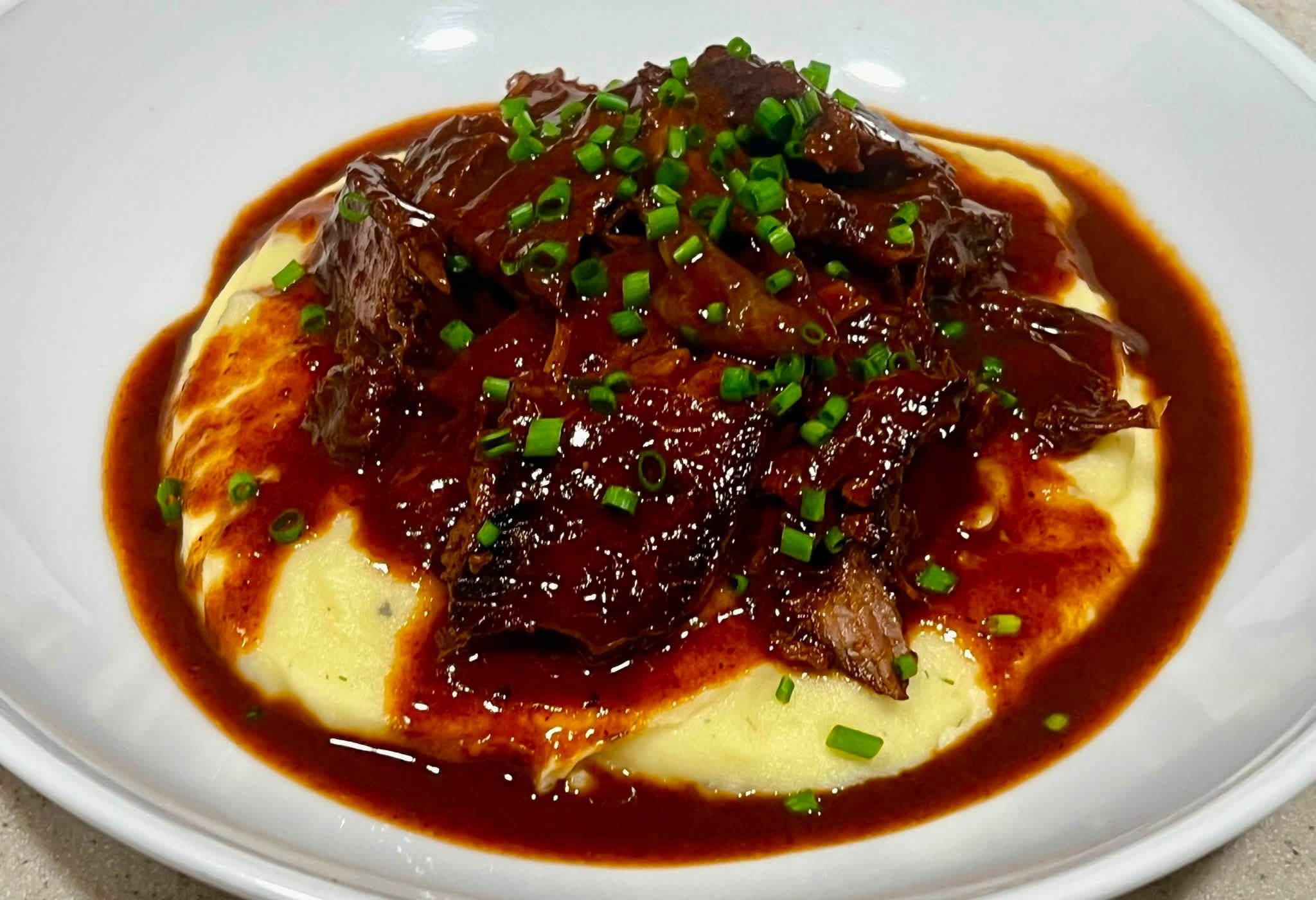 Red-Wine Braised Beef over Creamy Polenta